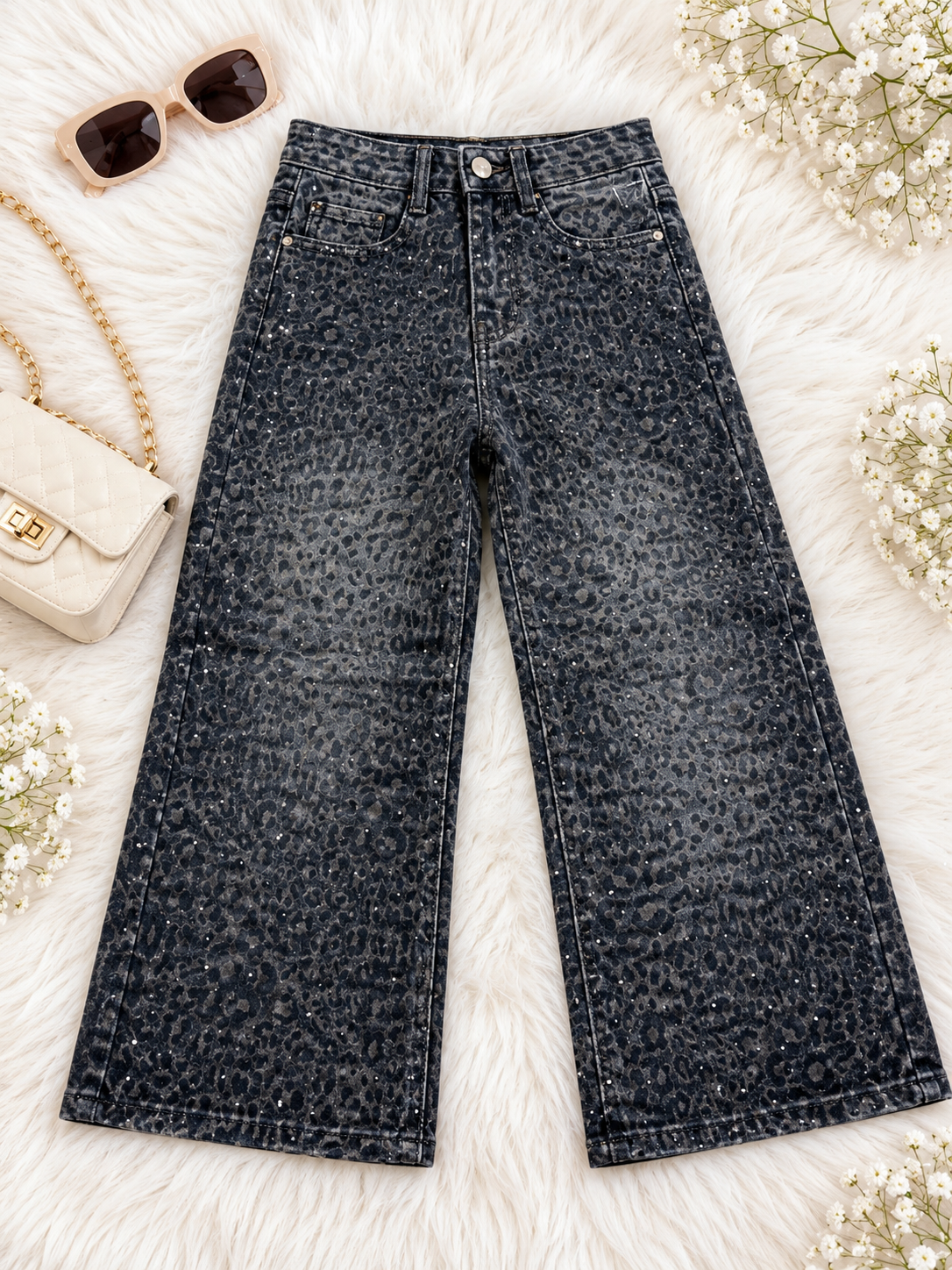 JEANS MACULATI SFUMATI CON STRASS