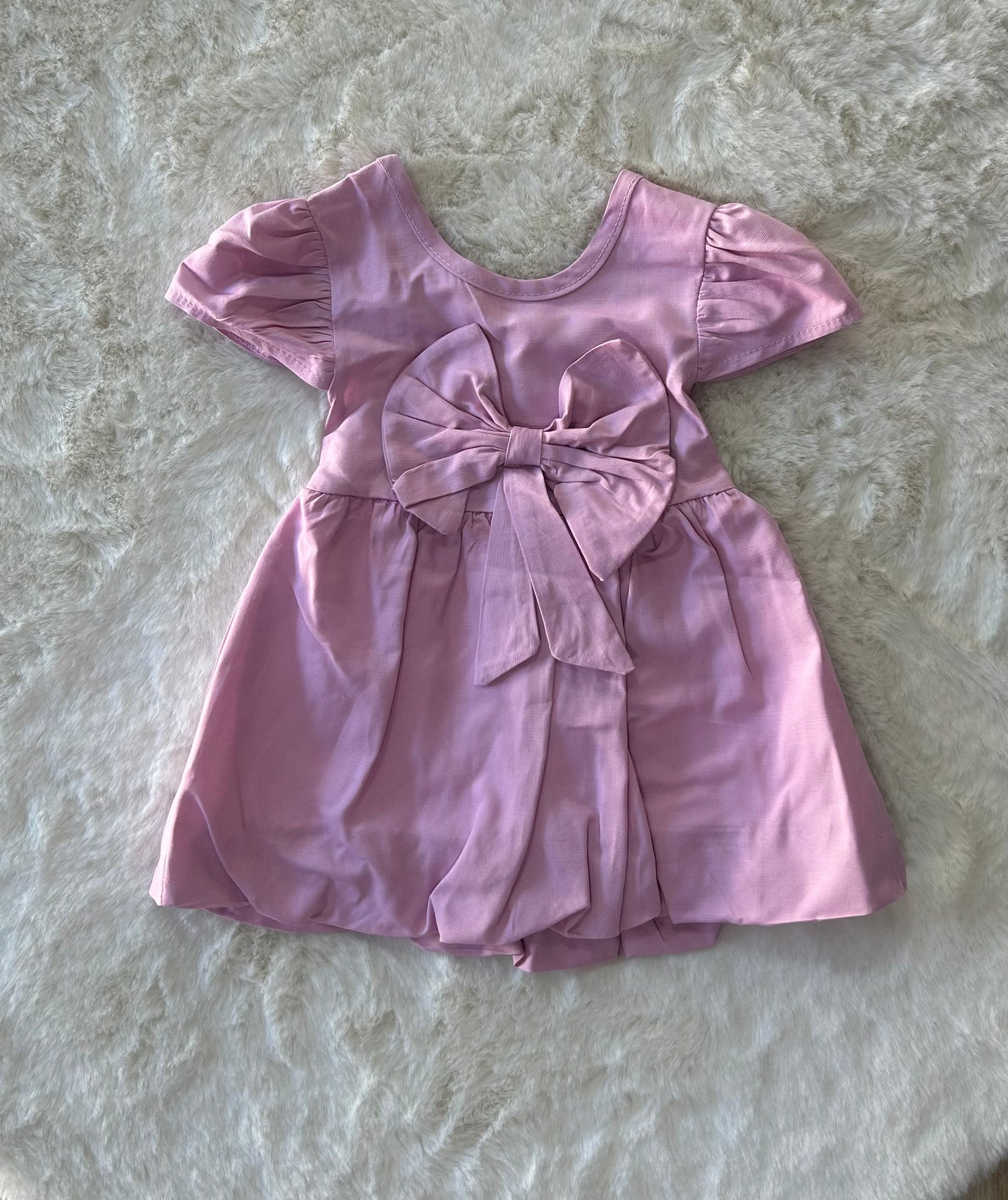 VESTITINO NEONATA CON SCOLLO ALLA SCHIENA