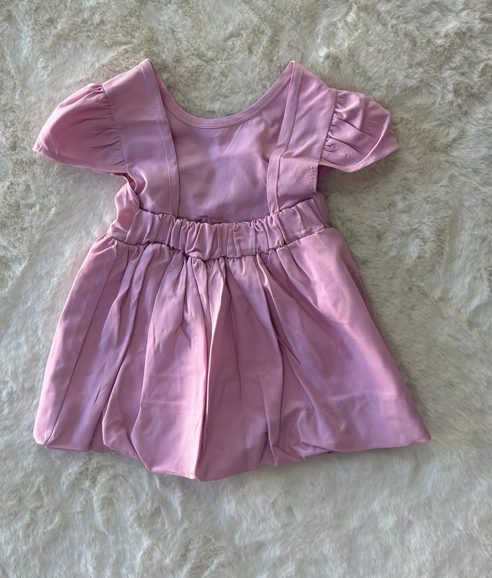 VESTITINO NEONATA CON SCOLLO ALLA SCHIENA