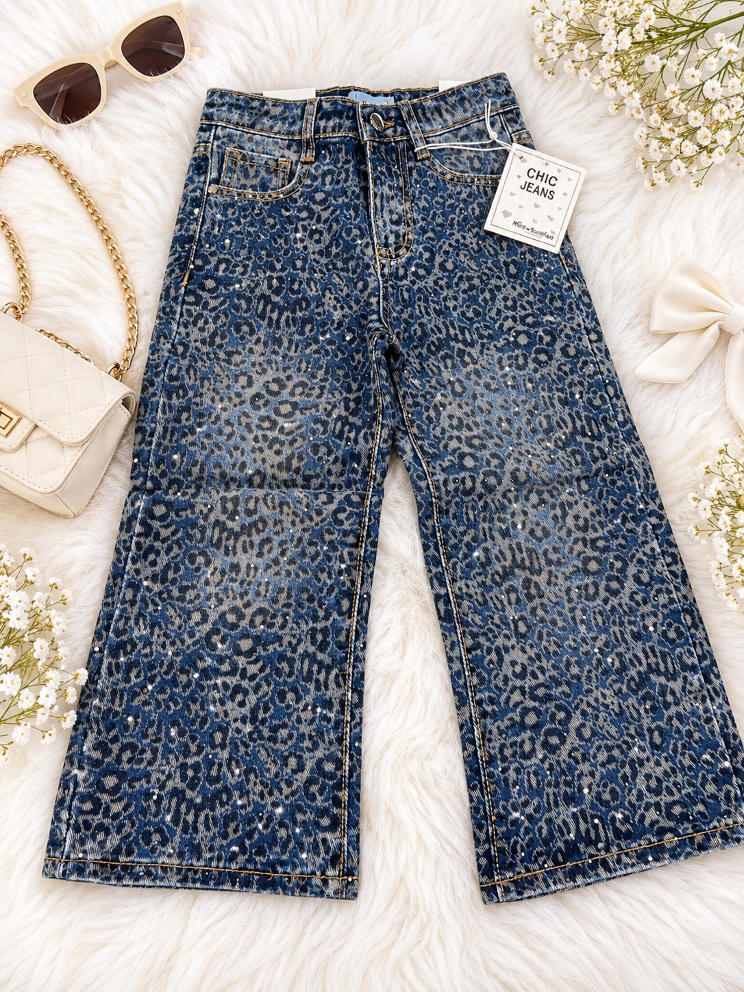 JEANS MACULATI SFUMATI CON STRASS