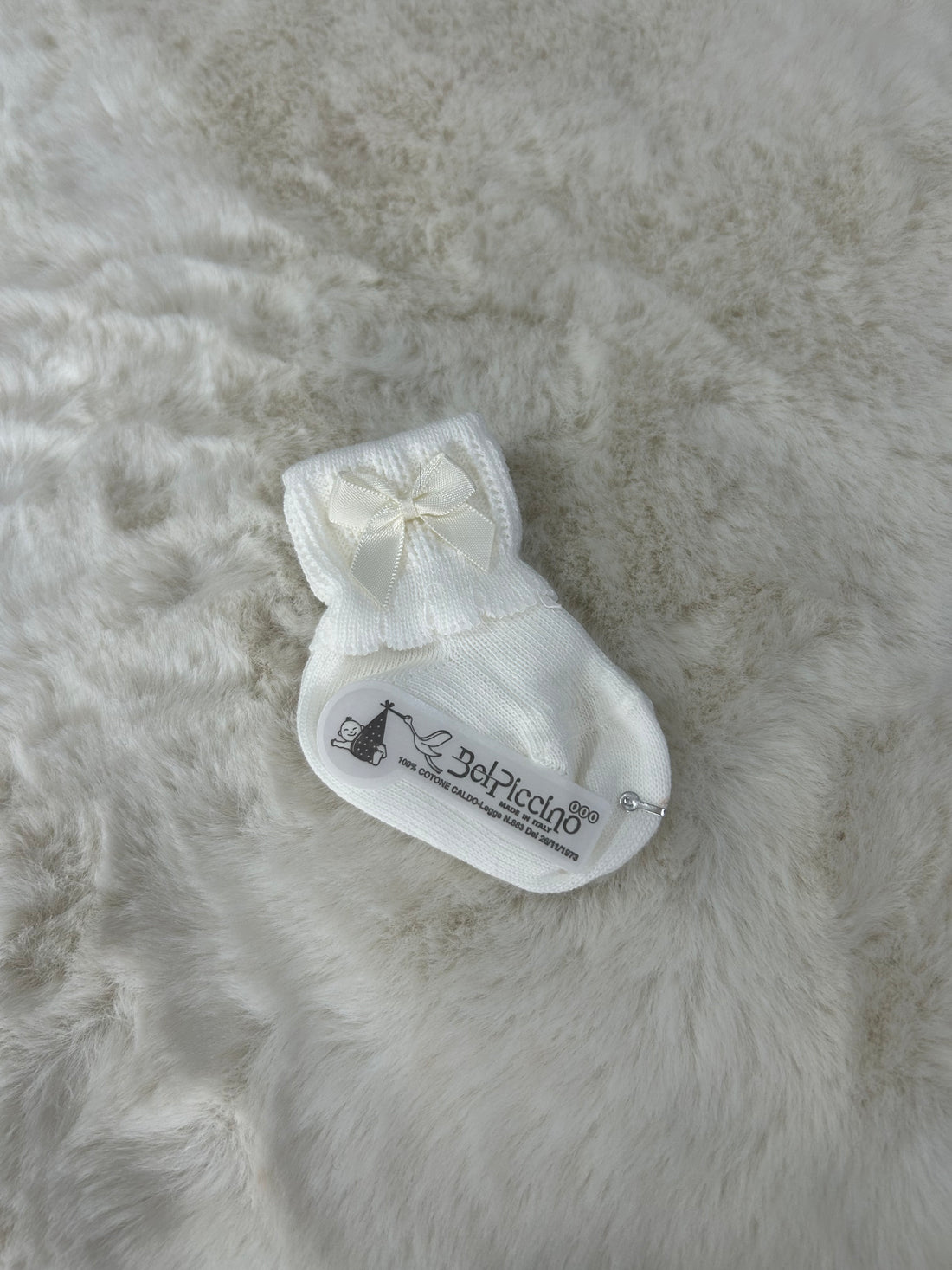 CALZINI NEONATA CON FIOCCO